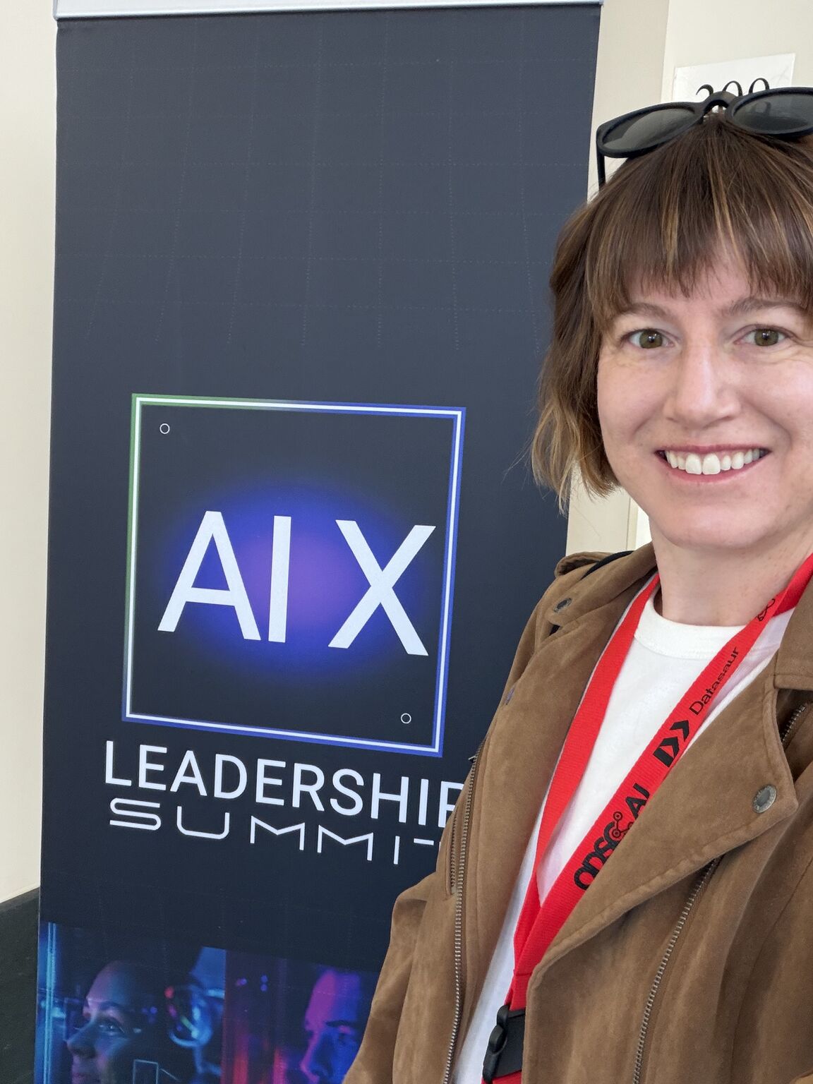 Lauren Saxton MC-ing at ODSC East AI Conference